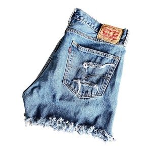 Hand distressed vintage Levi’s cut off denim shorts